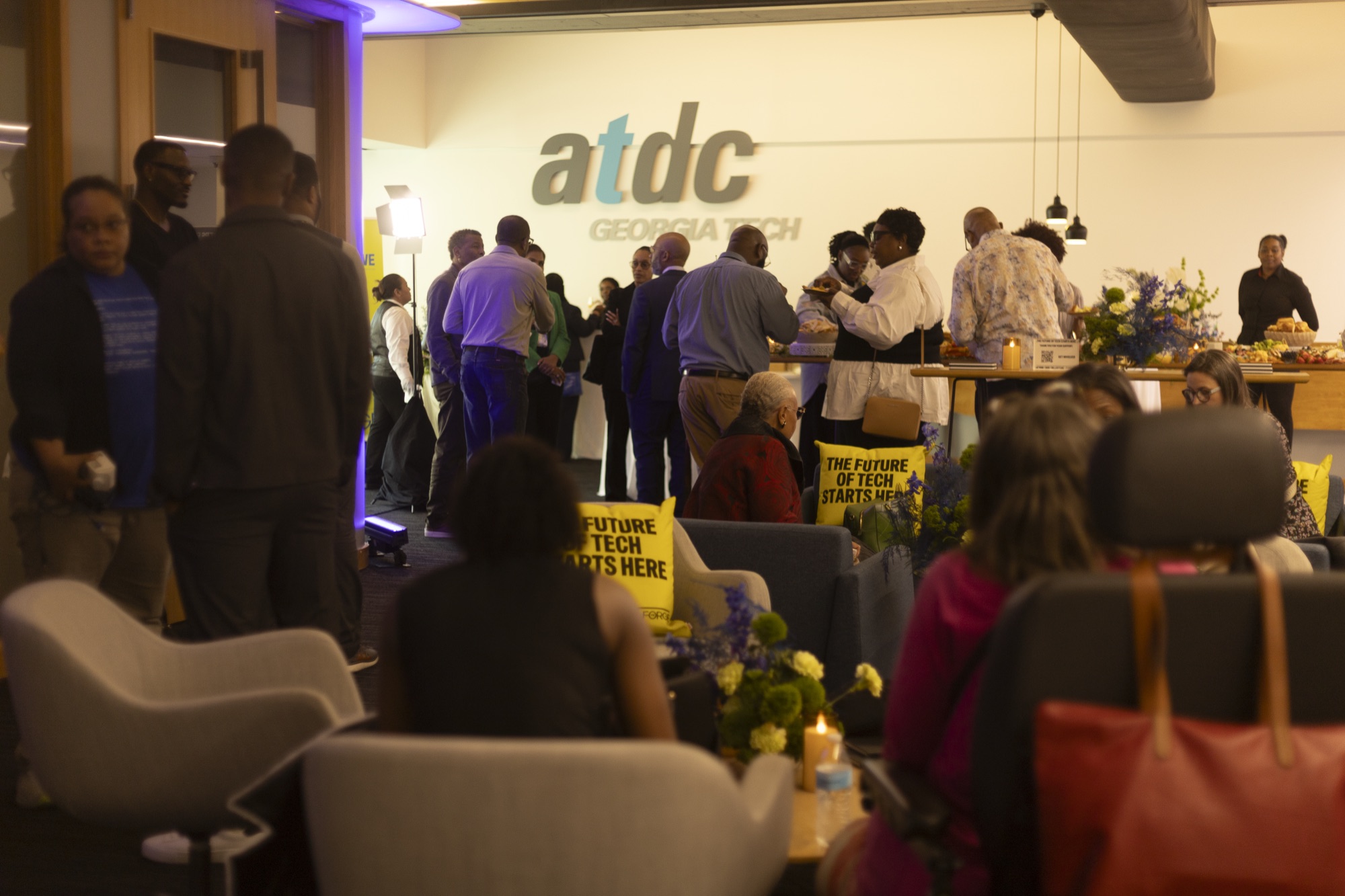 Attendees gathering in the lobby of the Forge opening party